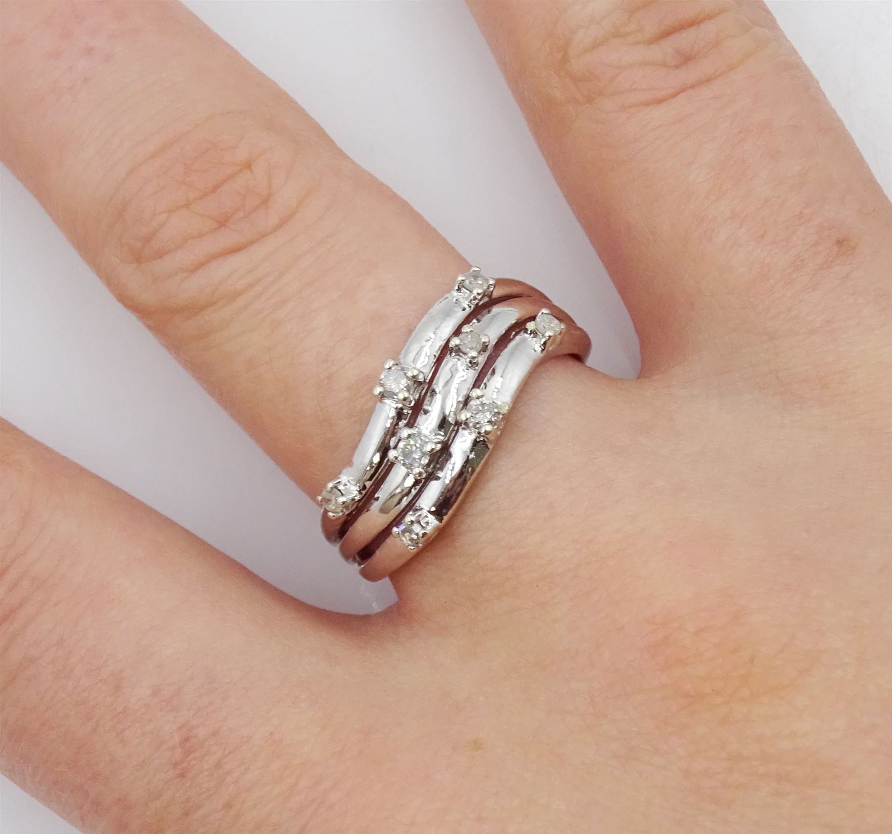 9ct white gold three row eight stone diamond ring, hallmarked
