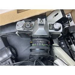 Collection of camera bodies and equipment, including Minolta X-700 camera body with Hoya HMC 55mm Skylight lens, Minolta XG2 camera body etc