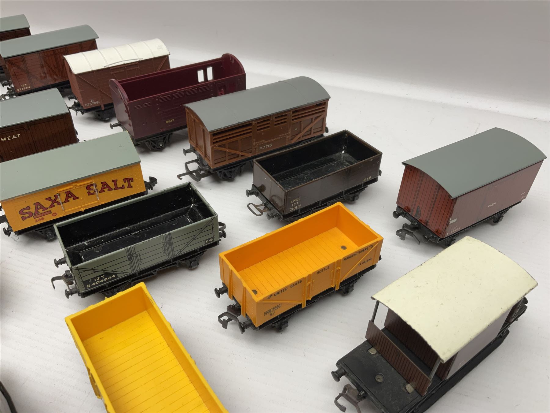 Hornby Dublo - forty-three goods wagons including nine tank wagons (Esso, Mobil, Vacuum, UD and Traffic Services), brake vans, meat and fish wagons, bogie well and bolsters, cable drums, open wagons, salt and grain wagons, etc; and six others by Tri-ang etc; all unboxed (49)