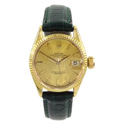 Rolex Oyster perpetual Datejust ladies 18ct gold automatic wristwatch, circa 1963, Ref. 6517, serial No. 882914, champagne dial with baton hour markers, hallmarked, on green leather strap