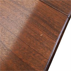 Regency design mahogany extending twin pedestal dining table with two additional leaves, raised on splayed supports terminating brass paw feet
Extends to 268cm