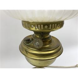 Brass oil lamp with frilled glass shade with floral detail converted to electricity, together with an aneroid barometer, L60cm