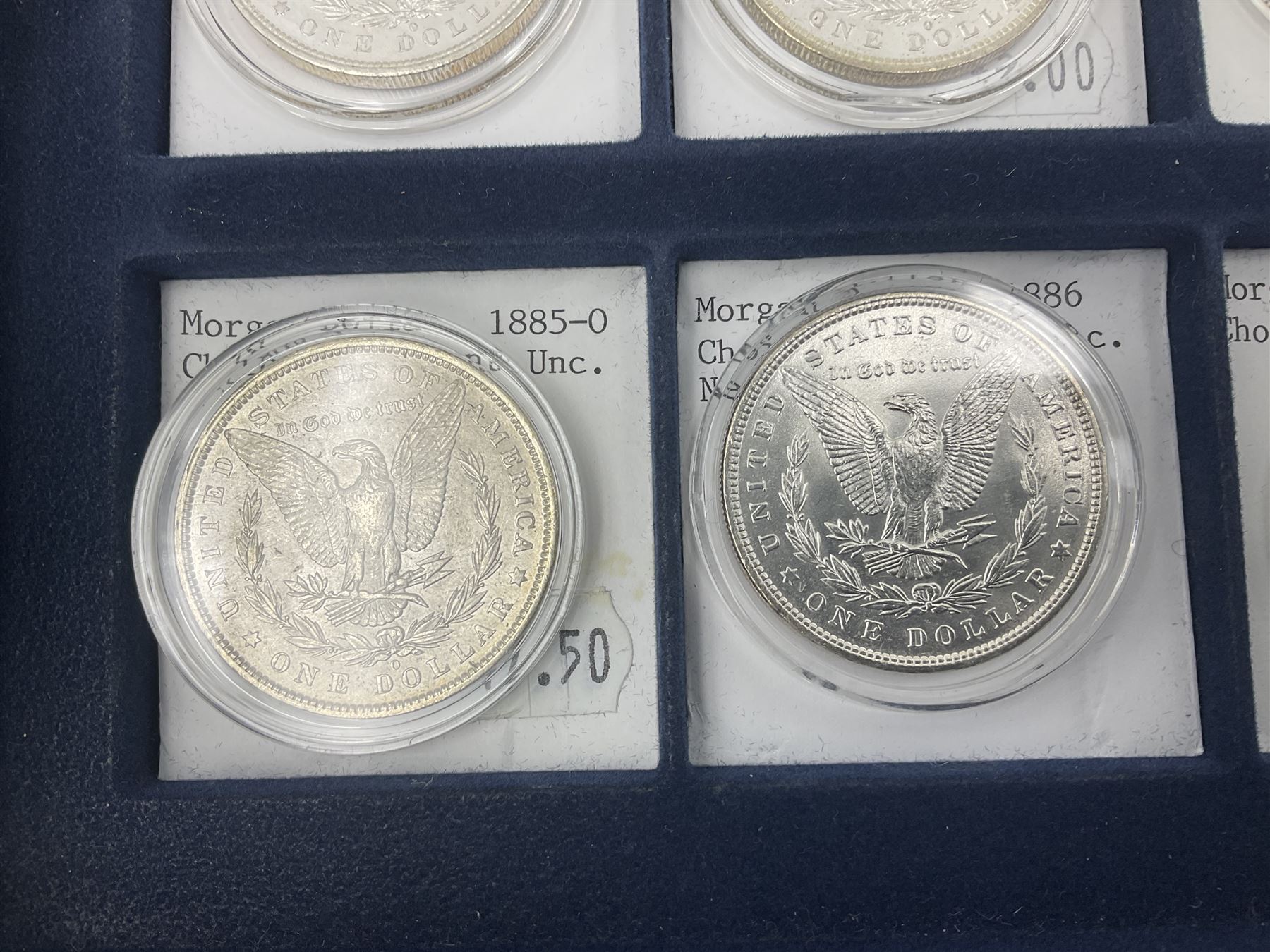 Twelve United States of America silver Morgan dollar coins, dated 1878 S, 1879 S, 1880 S, 1881 S, 1882 O, 1883 O, 1884 O, 1884 CC, 1885 O, 1886, 1887 and 1888