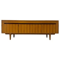 Younger - 1960s teak sideboard, three drawers over three cupboard, centre draw lined with baize with dividers, recessed handles with tapered feet