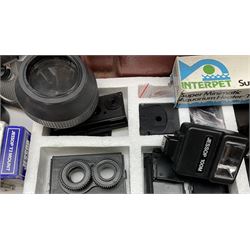 Camera lenses, flash guns and accessories, to include Tamron Adaptall 2,  tripods, a large metal trunk, together with photo developing equipment two enlargers, developer tanks and trays, Paterson contact printer etc.  