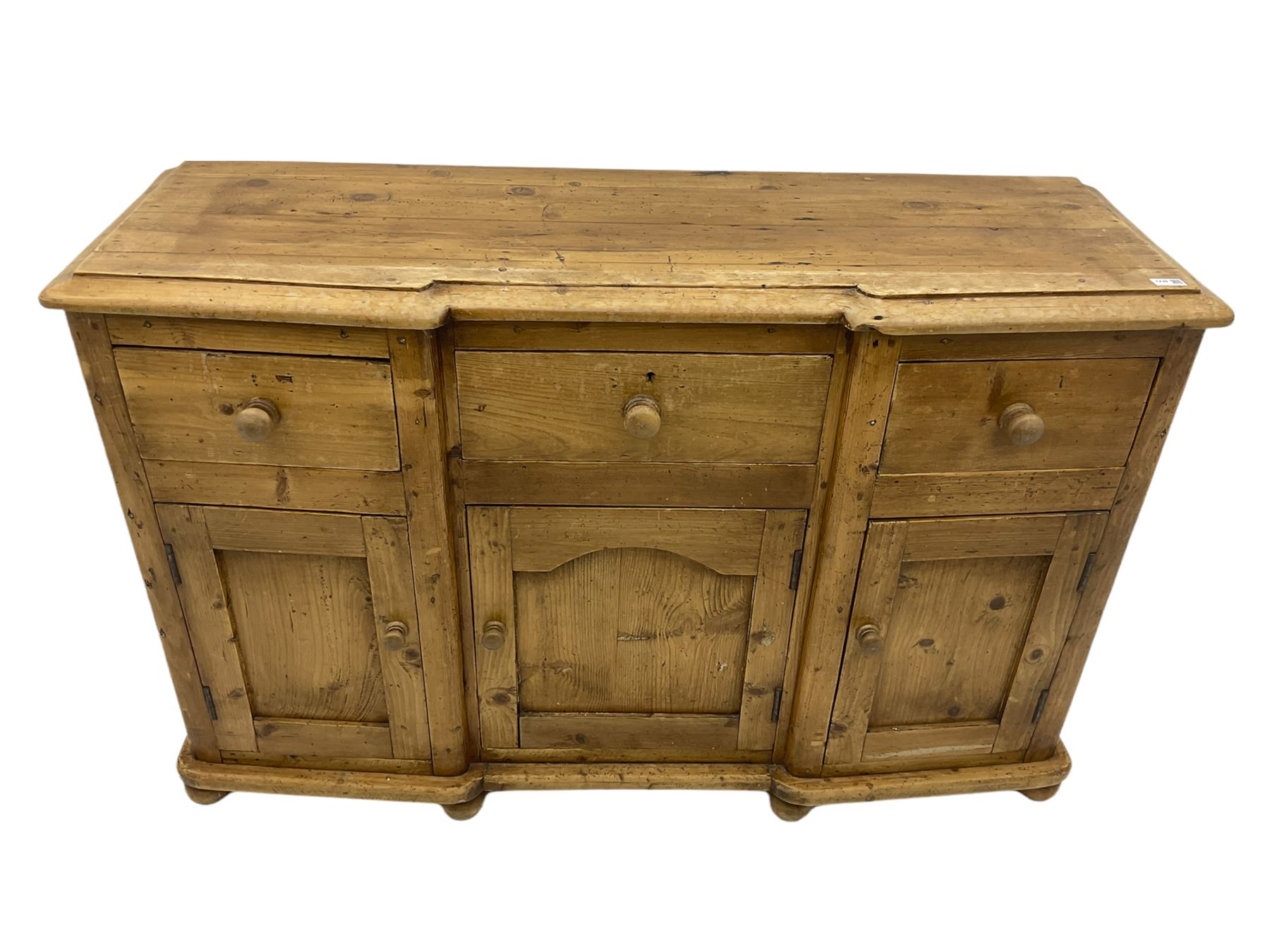 Stripped pine dresser, fitted with three drawers and three cupboards