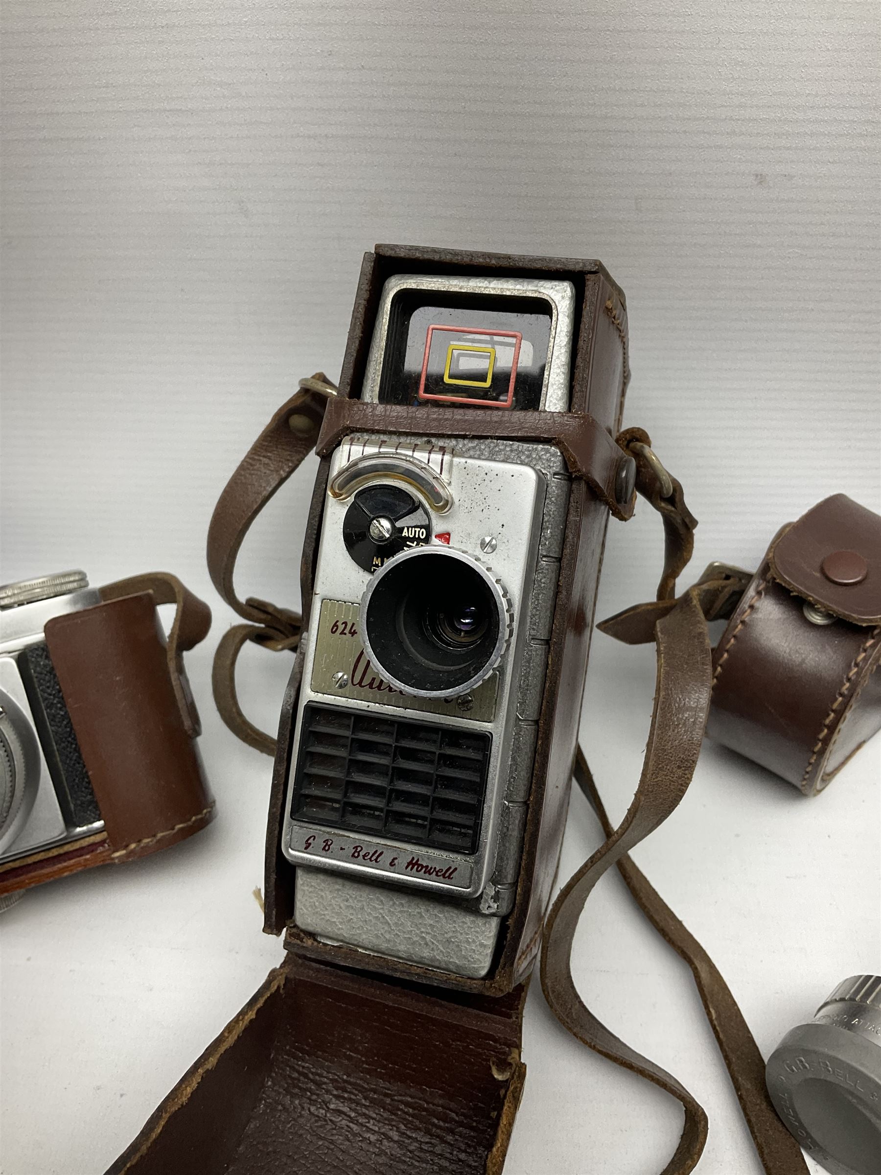 Ensign Ranger II folding roll film camera, Beirette Junior II camera and Bell & Howell 624 EE Autoset hand-wind cine camera, all in cases