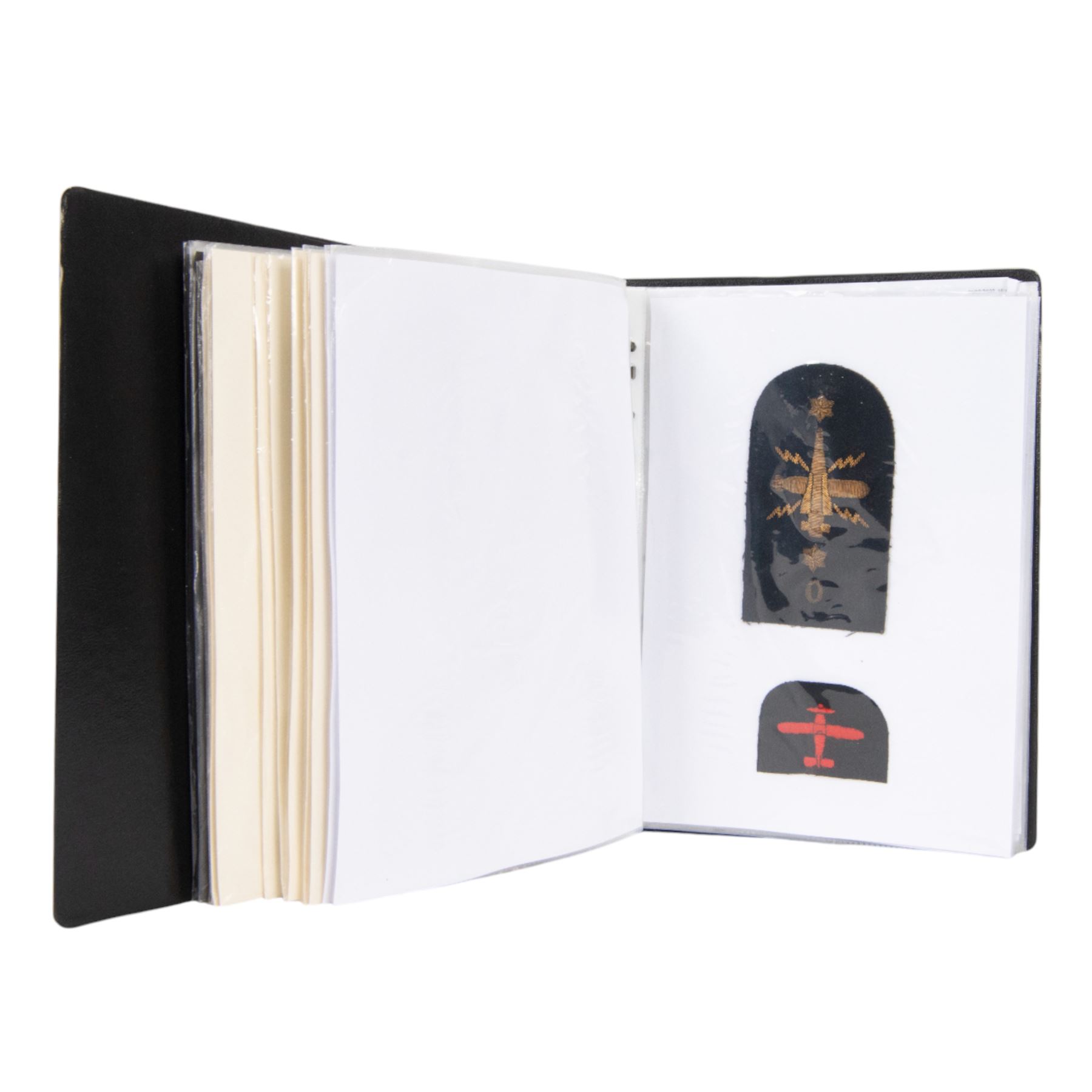 Collection of Royal Navy trade badges, including gold bullion thread examples, over one hundred items, in a binder file