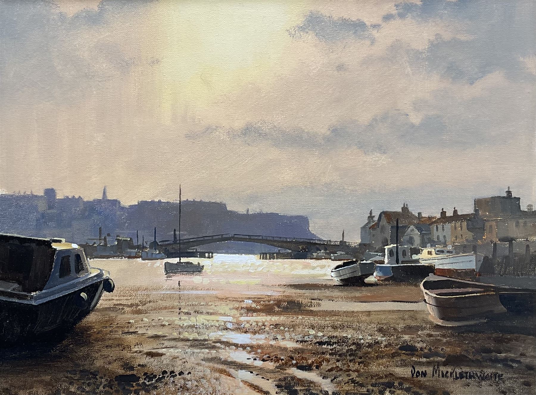 Don Micklethwaite (British 1936-): Whitby Swing Bridge at Sunset, oil on canvas signed 30cm x 39cm 