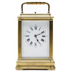 French-19th century 8-day quarter striking carriage clock with strike repeat in a Gorge case, white enamel dial with Roman numerals and steel spade hands, twin barrel movement striking the quarters and hours with two hammers on two coiled gongs to the backplate, silvered platform lever escapement with a jewelled balance and timing screws, with a full, strike, silent, and quarter selection lever to the base. 
Serial number 18874.