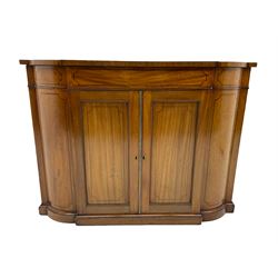 Early 19th century mahogany sideboard, break and curved front, double panelled cupboard, on plinth base