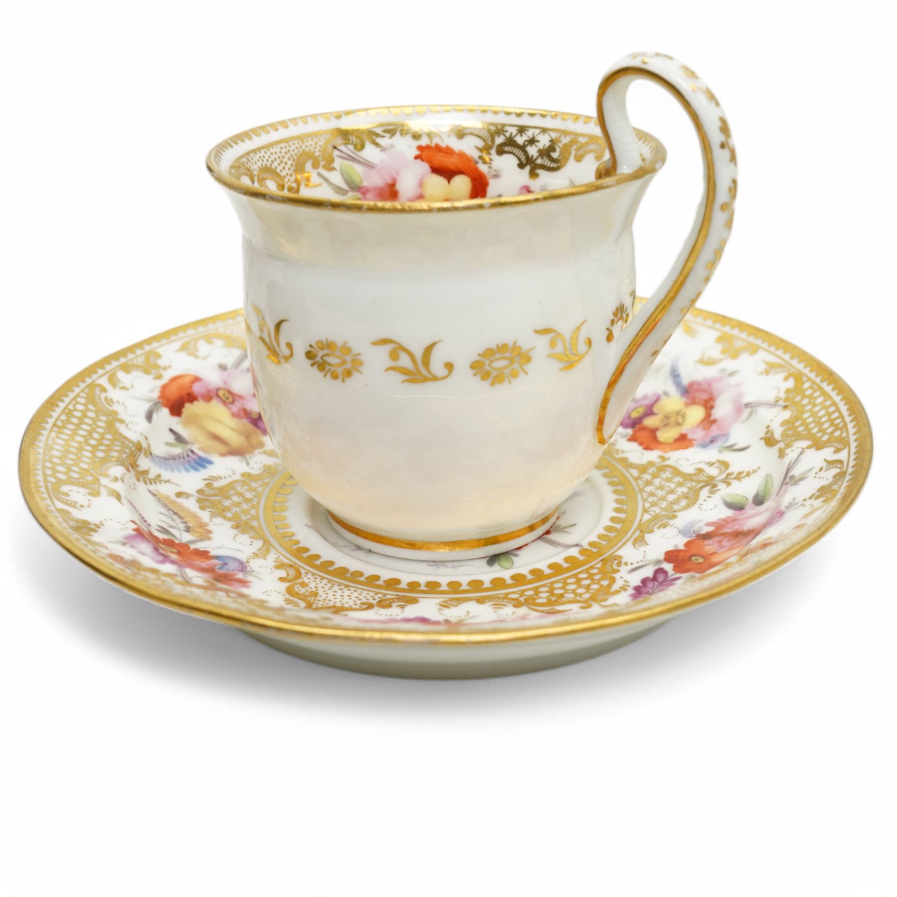 Coalport tea and coffee cups, pattern no. 830, decorated with sprays of flowers within gilt borders, comprising three teacups, four coffee cups and five saucers, with another matched teacup and saucer 