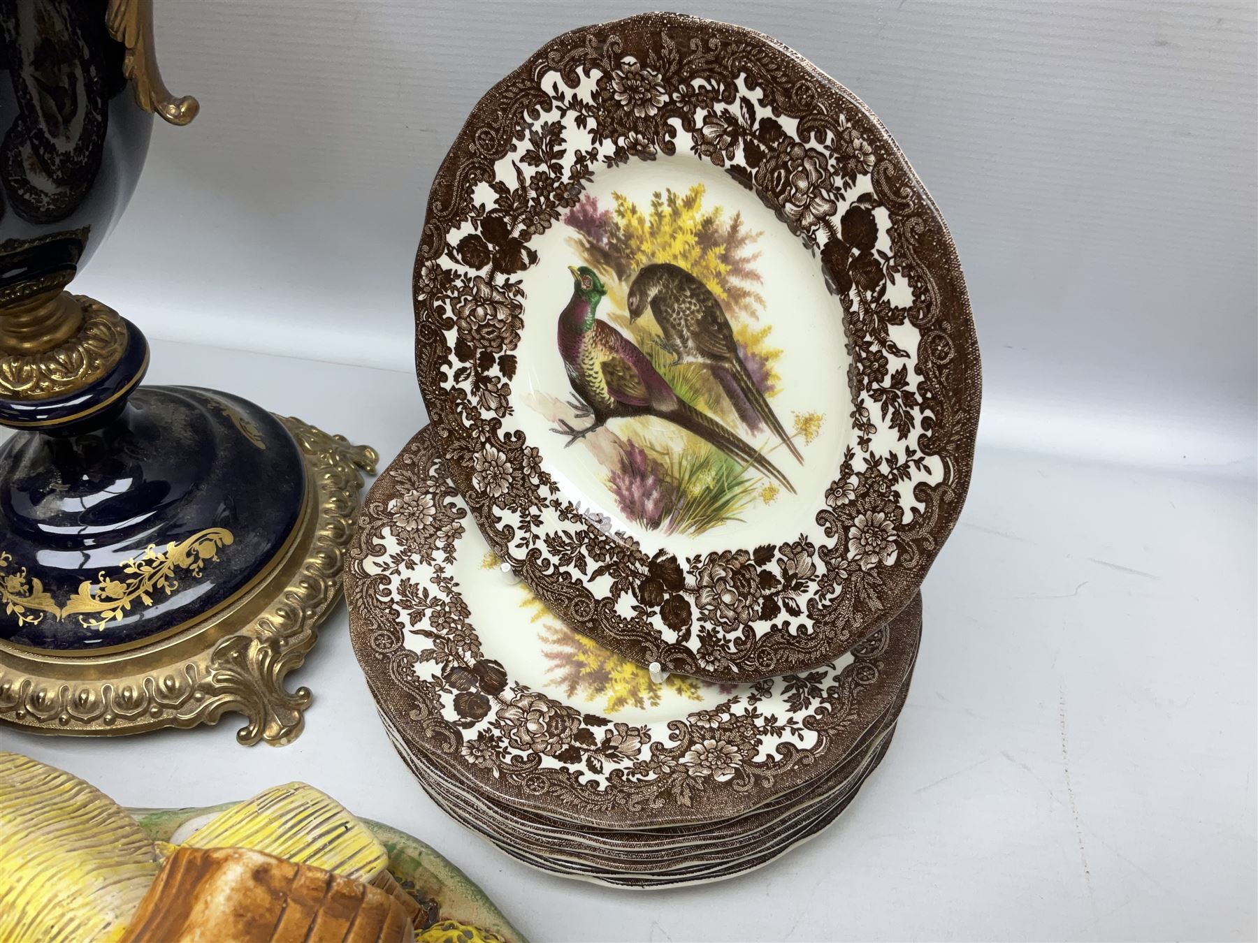 Sevres style vase and cover, the body of baluster form with scrolling gilt metal mounts printed with courting couple scene, together with copper lustre jug and quantity of Royal Worcester Palissy Game Series plates, quantity of Pendelfin figures etc, vase H44cm