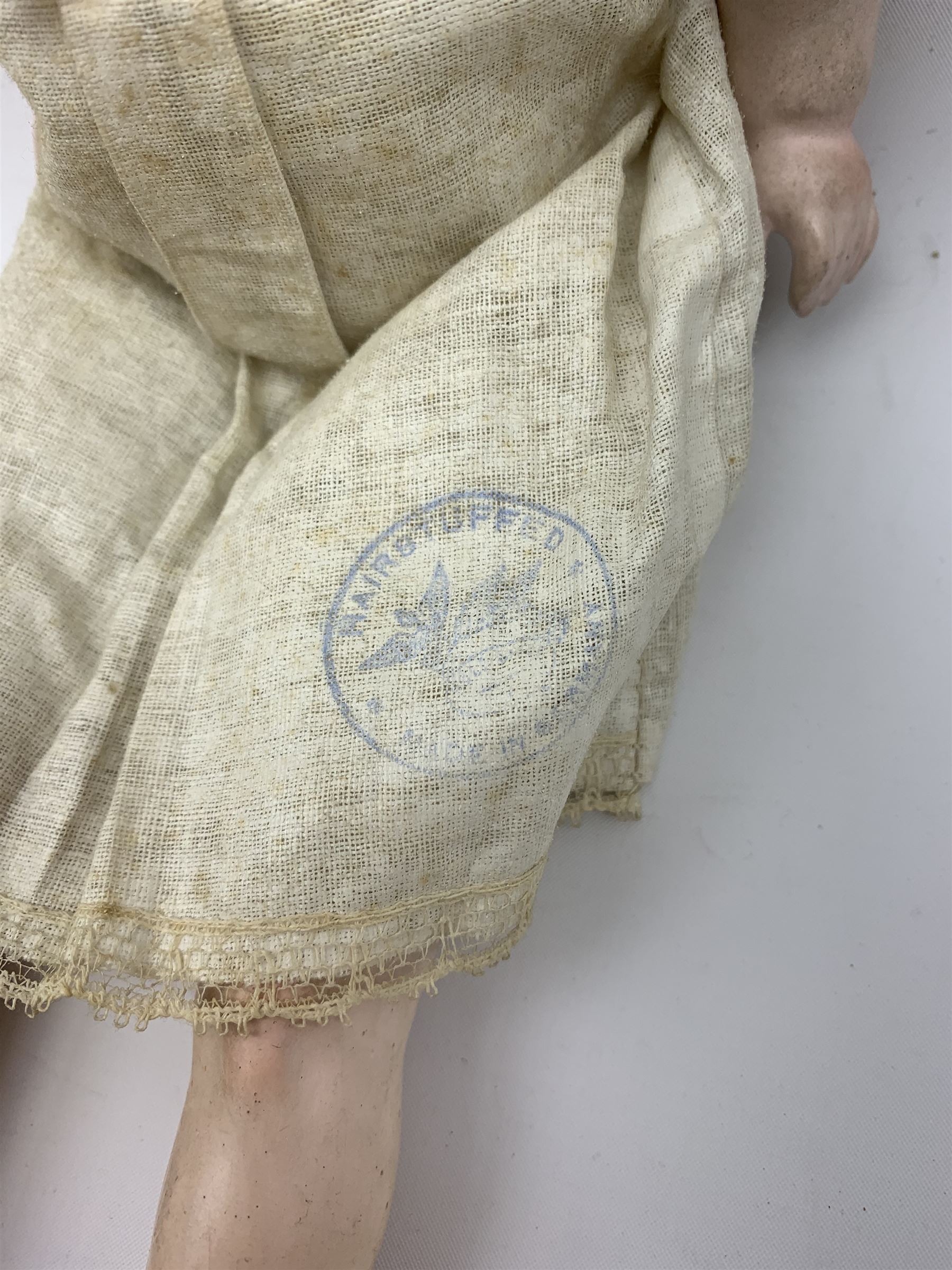 Early 20th century Cuno and Otto Dressel wax shoulder head doll with applied hair and fixed glass eyes, soft body with jointed composition lower limbs, maker's stamp to right thigh, clothing and box H38cm in original box