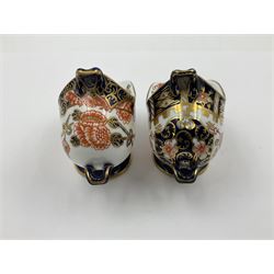 Group of Crown Derby and Royal Crown Derby Imari pattern miniatures, including mid 19th century Stevenson and Hancock cauldron, with painted mark beneath, H5.5cm, a near pair of early Royal Crown Derby scuttles, decorated in the 6299 pattern, each with printed and painted marks beneath including illustration date codes for 1913 and 1922, tallest 6.5cm, and a further early 20th century Royal Crown Derby scuttle, decorated in the 6299 pattern, with printed and painted marks beneath including illustration date code for 1922, H5.5cm, (4)
