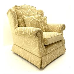 Two seat sofa (W167cm), and matching armchair (W97cm), upholstered in pale cream fabric with raised foliate pattern