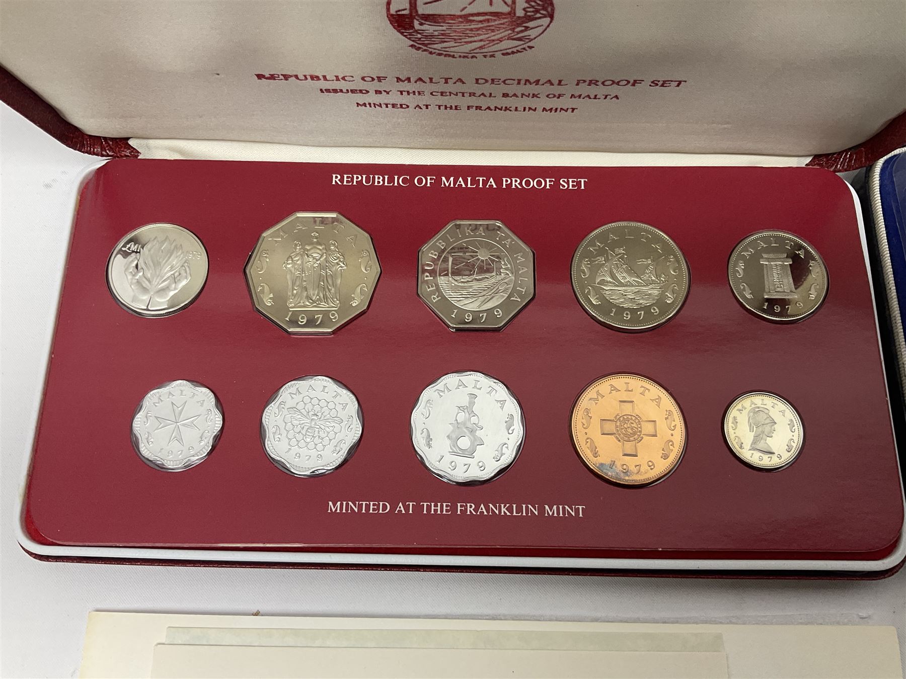 First National Coinage of Barbados 1973 proof eight coin set, from ten dollars to one cent, the ten dollar coin minted in sterling silver, the five dollar coin minted in 800 silver, and a Barbados 1974 proof eight coin set, both minted at The Franklin Mint, cased with certificates; two Republic of Malta decimal proof coin sets, dated 1978 and 1979, the 1979 one pound coin minted in sterling silver, both minted at The Franklin Mint, cased with certificates; Cayman Islands 1973 proof eight coin set, minted at the Royal Canadian Mint, cased; and a Cayman Islands 1979 proof eight coin set, the five dollar to fifty cents coins each minted in sterling silver, minted at the Franklin Mint, cased with certificate (6)