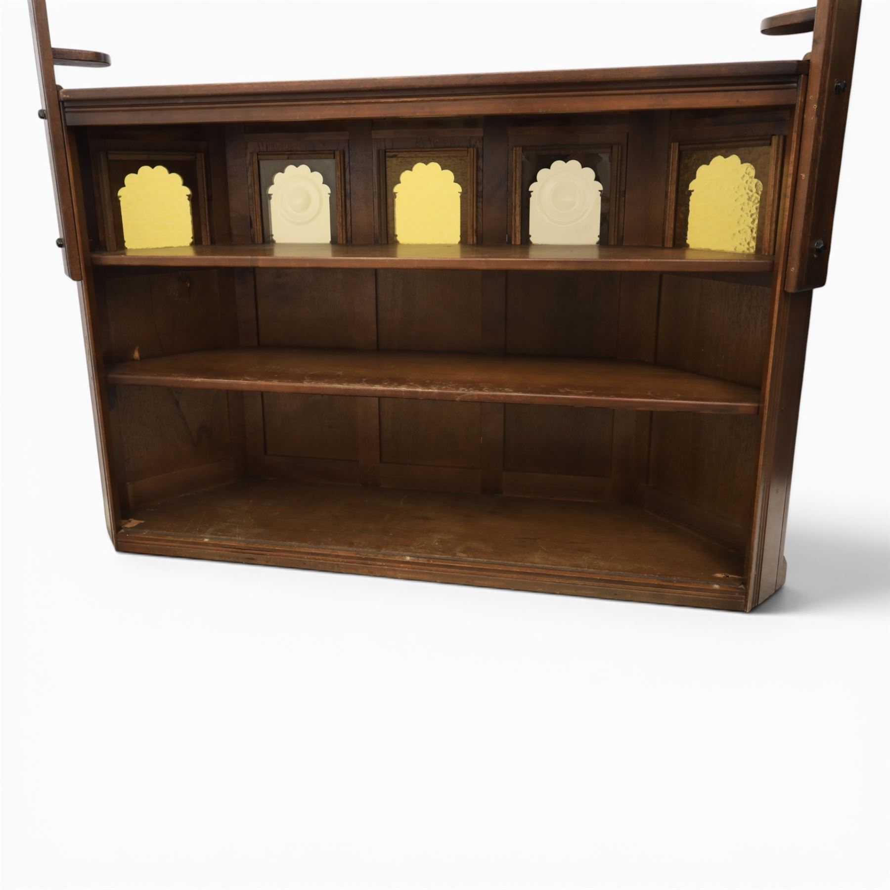 Old Charm - carved oak bar with three bar stools and associated Old Charm drinks cabinet, carved top with channels for glassware beneath, bar surface above glazed panels, shelves for glassware to the back, associated Old Charm drinks cabinet with fall front linenfold carving, above twin doors with shelved interior