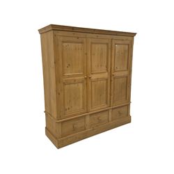 Solid pine triple wardrobe with three drawers