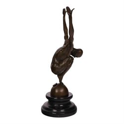 After Milo - bronze figure of a man in perfect balance, bearing signature and foundry mark, overall H29cm