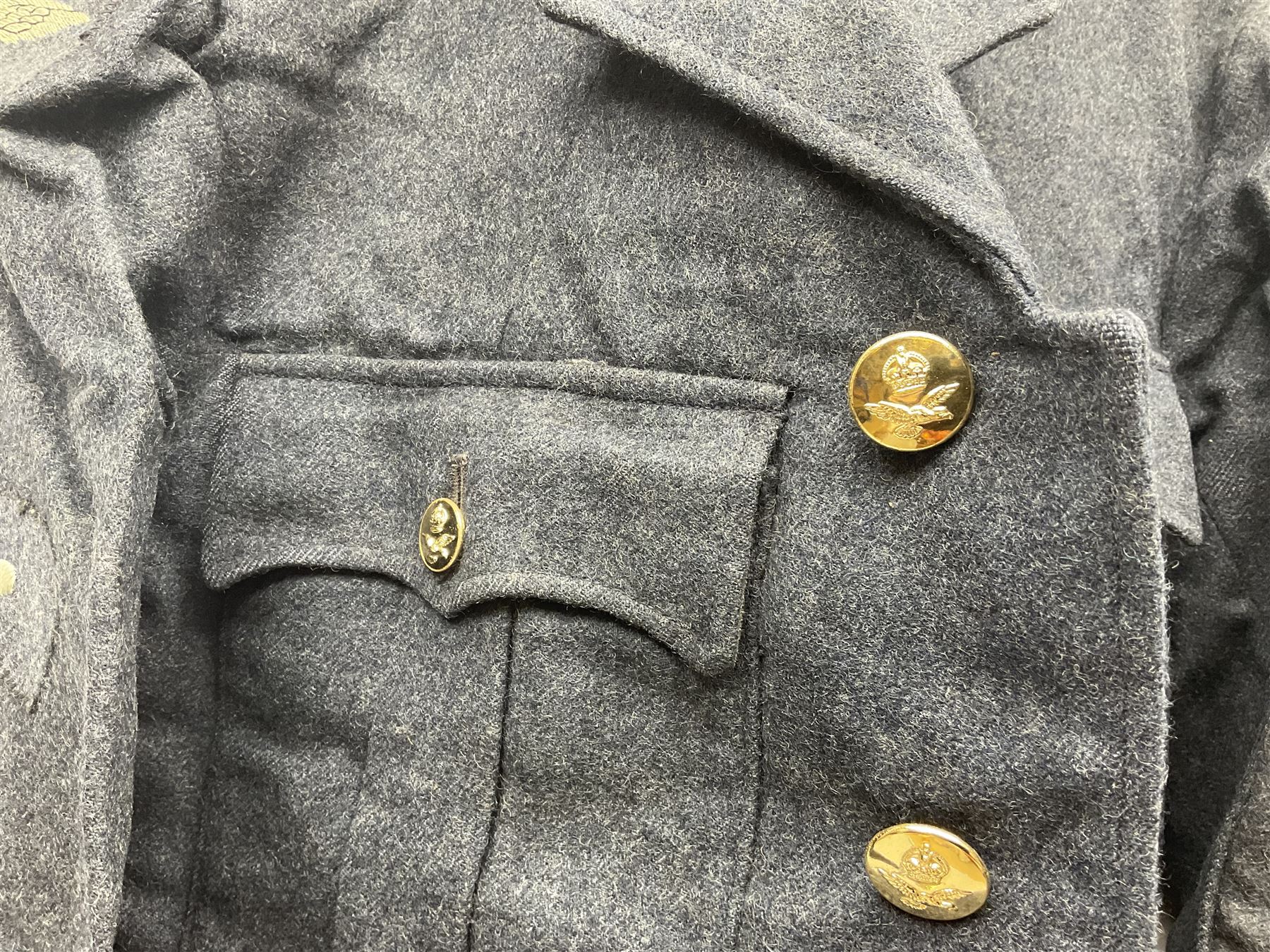 British RAF uniform, including jacket and trousers, modern RAF uniform buttons and a collection of reproduction wartime newspapers