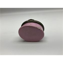 Late 18th century Staffordshire enamel patch box, of oval form with pink base, the hinged cover inscribed 'Have Communion with few, Be familiar with One, Deal justly with All, Speak evil of none' upon a white ground, opening to reveal mirror beneath, W4cm