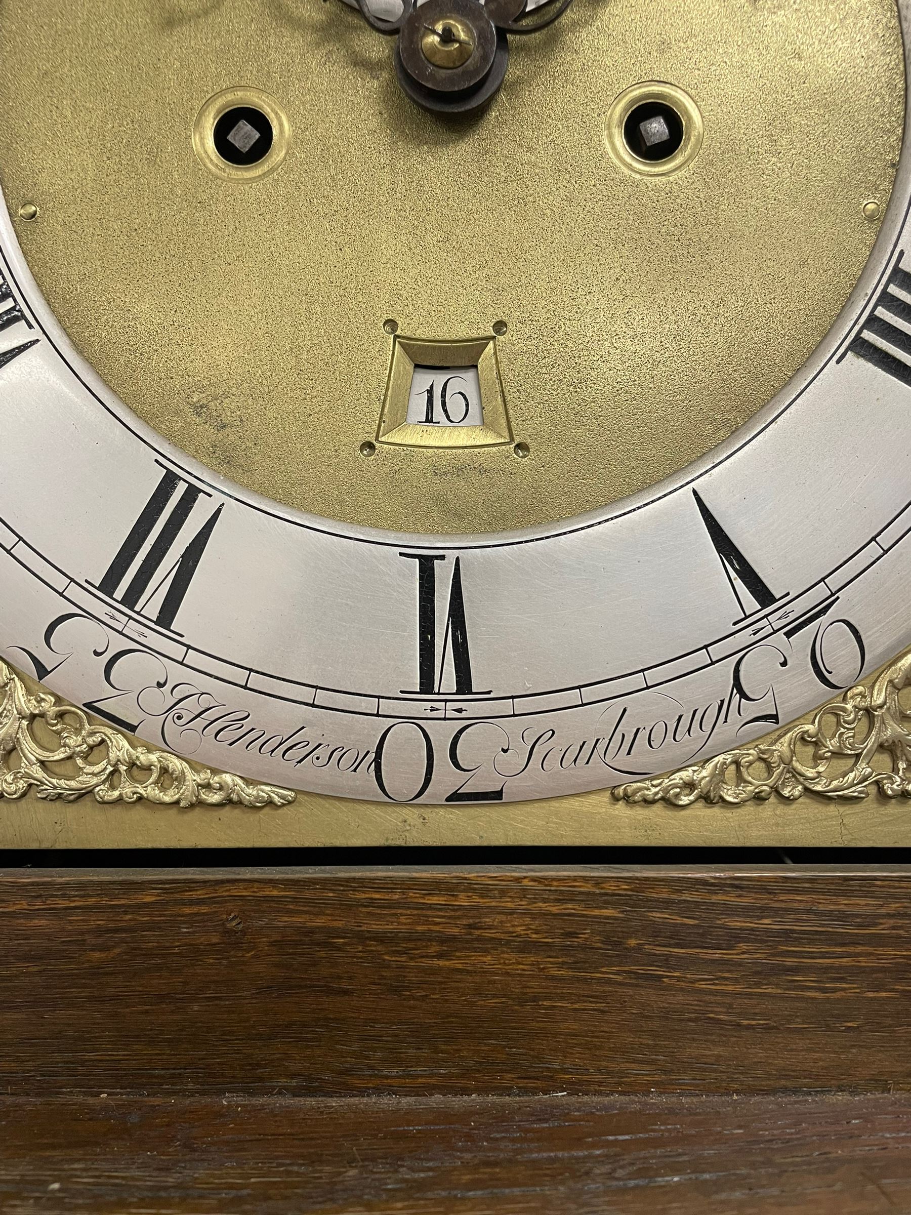Jeremiah Henderson of Scarborough - 8-day longcase clock in an Elm case c1765,  with a flat top and broad cornice, square hood door flanked by two plain turned pilasters with gesso capitals, long trunk with a conforming door and break arch top, square brass dial with a matted centre, cast spandrels and ringed winding holes, silvered chapter ring with Roman numerals, five minute Arabic's, minute track and finely pierced matching steel hands, dial pinned to a rack striking movement with an anchor escapement. With weights and pendulum. Jeremiah Henderson was the son of Robert Henderson, the first recorded clockmaker in Scarborough. 