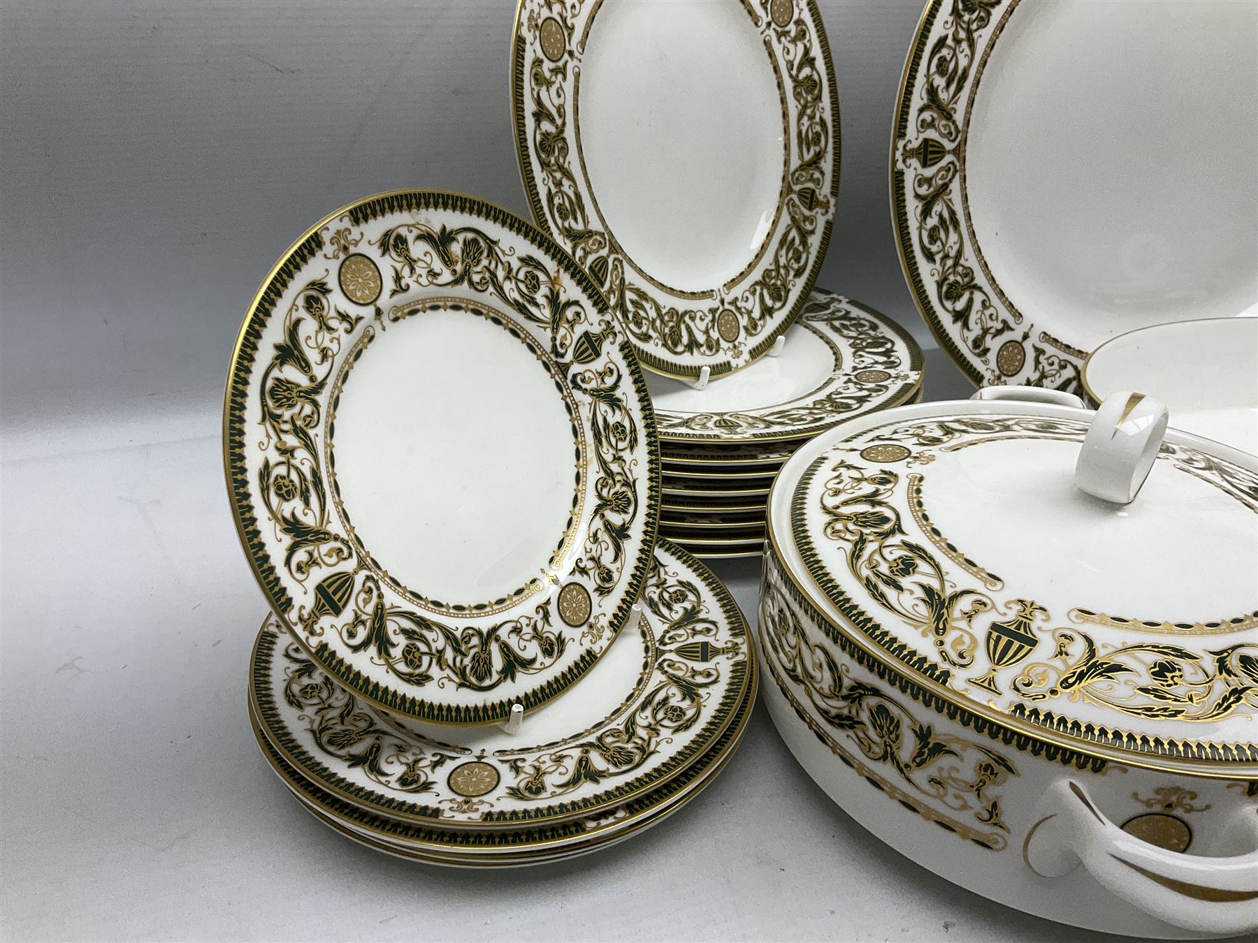 Royal Worcester Windsor pattern part tea and dinner service, comprising nine dinner plates, nine side plates, nine dessert plates, six coffee cans and saucers, sauce boat and plate, two covered tureens, oval dish and serving platter (35)