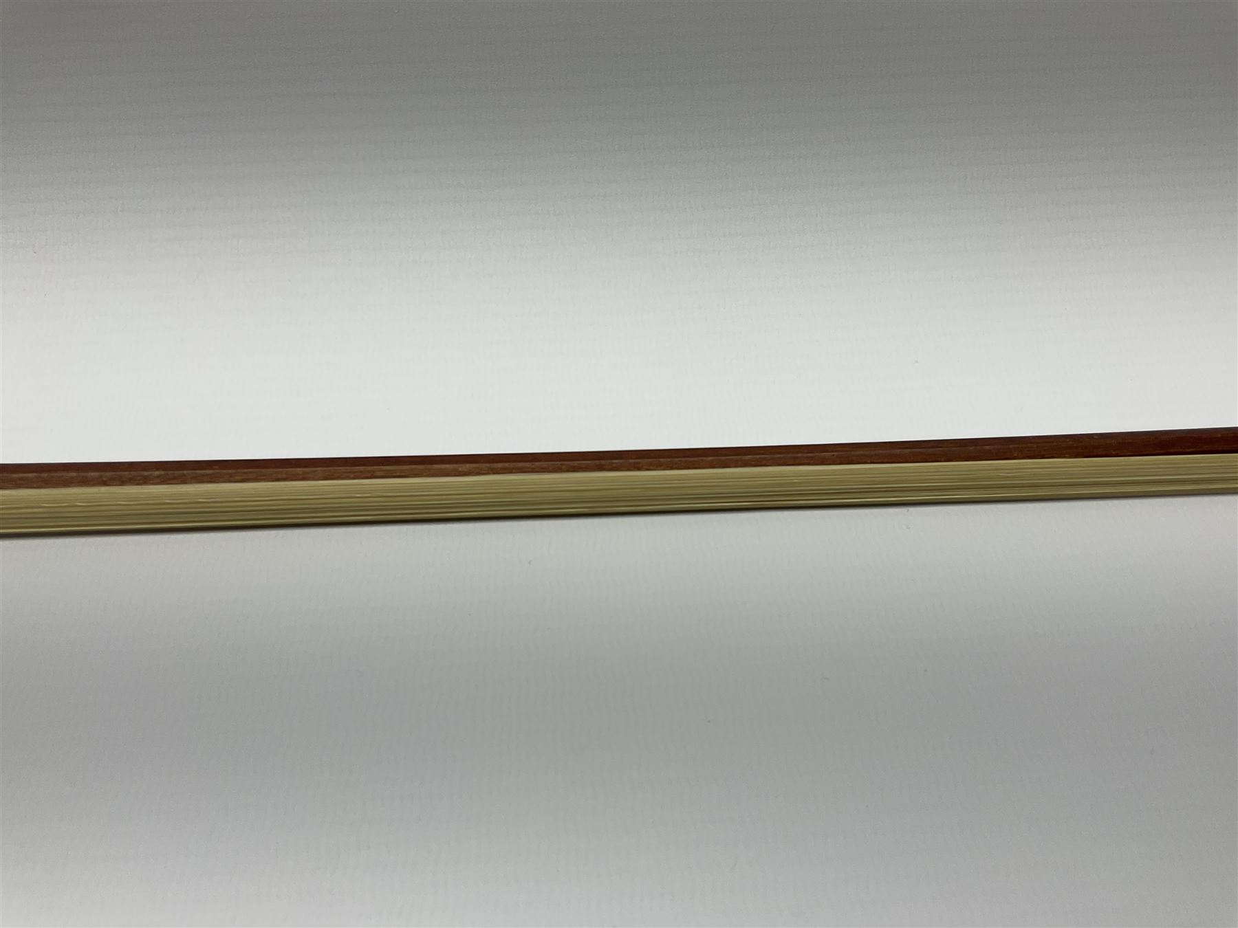 Alfred Knoll silver mounted two-star pernambuco violin bow L74.5cm