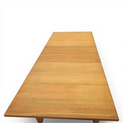 Contemporary teak dining suite comprising extending table and eight chairs, the table with rectangular plank top and one additional leaf extending to 210cm, supported on square tapering legs, the chairs with tall slatted backs and cream upholstered seats