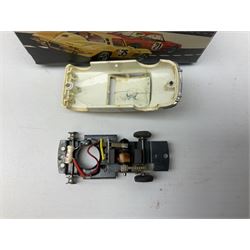 Various makers - Tri-ang Mini-Hi-Way Racing Car Series Le Mans No.9 racing car; Matchbox K-15 Merryweather Fire-Engine; Marx tin-plate Friction Helicopter; all boxed; and a Minic Motor Rally Adventure box containing a Jaguar Police car for spares or repair (4)