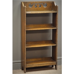  Early 20th century oak two tier bookcase, bead moulding to uprights, fret work back, W46cm, H92cm, D16cm  