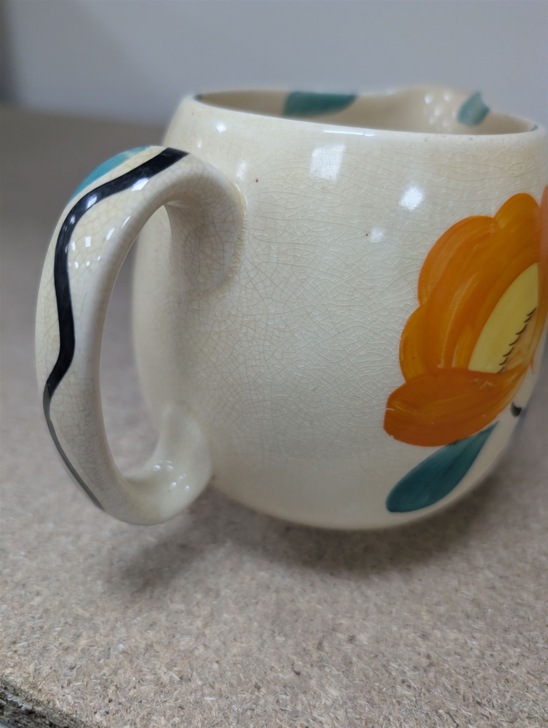 Collection of Susie Cooper ceramics, including jugs, vases and a teapot 