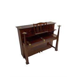 Carl Bechstein - late 19th century German overstrung upright piano, in a model 4 Arts and Crafts case designed by Walter Cave, with a lattice music desk and fretted silk backed front panel, brass hinged case lid and key fall with square tapered candle holders and circular sconces, iron frame, serial number 52187 (1899-1900), with an under damper action, 85 ebony and ivory keys, sustain and una corda pedals, original action, stringing, dampers, and action return straps, registered case number 328639, USA patent 24805.

This item has been registered for sale under Section 10 of the APHA Ivory Act