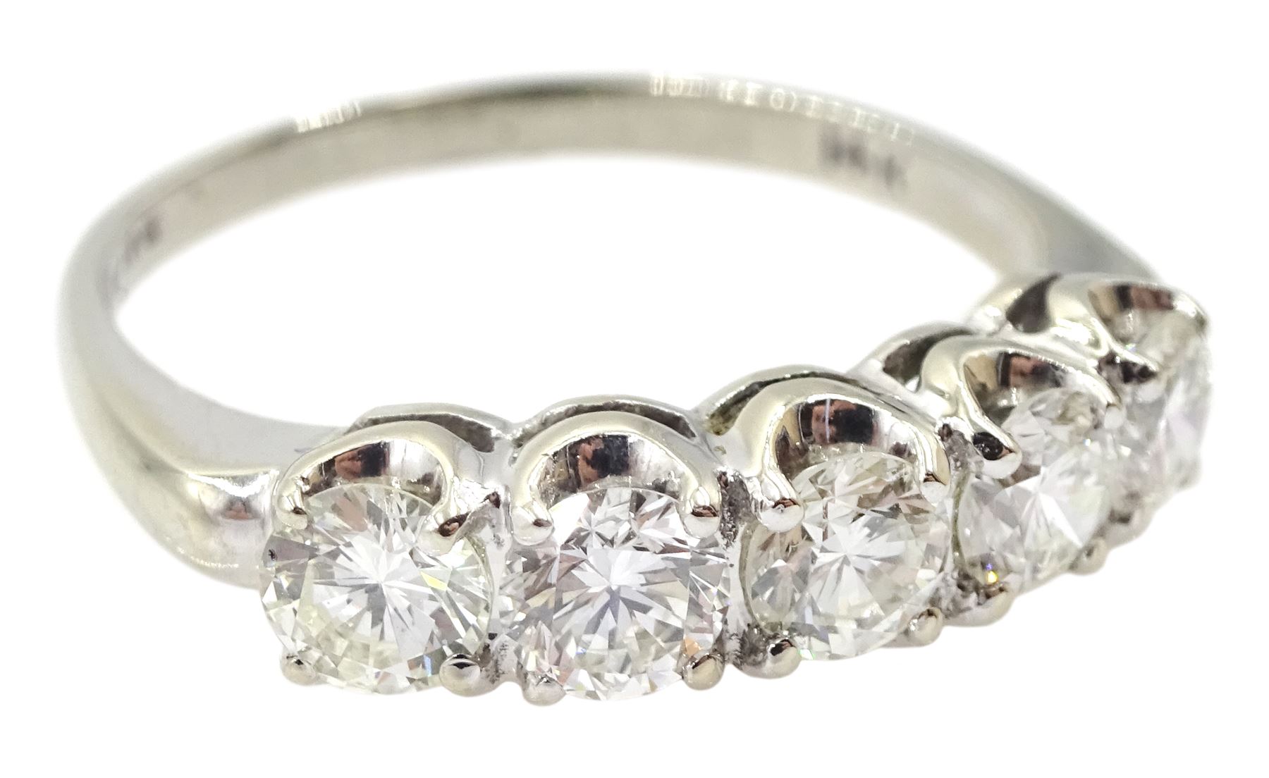 American white gold five stone diamond ring, stamped 14K by Balco Diamonds, Beverly Hills, total diamond weight 1.05 carat, with Ballreich & Co insurance certificate
