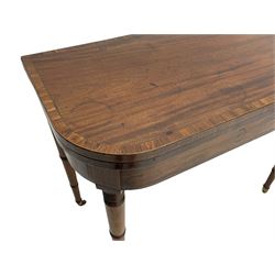 George III mahogany tea table, D-shaped fold-over top with rosewood band, the frieze inlaid with stringing, double gate-leg action base, on collar turned supports with bass cups and castors