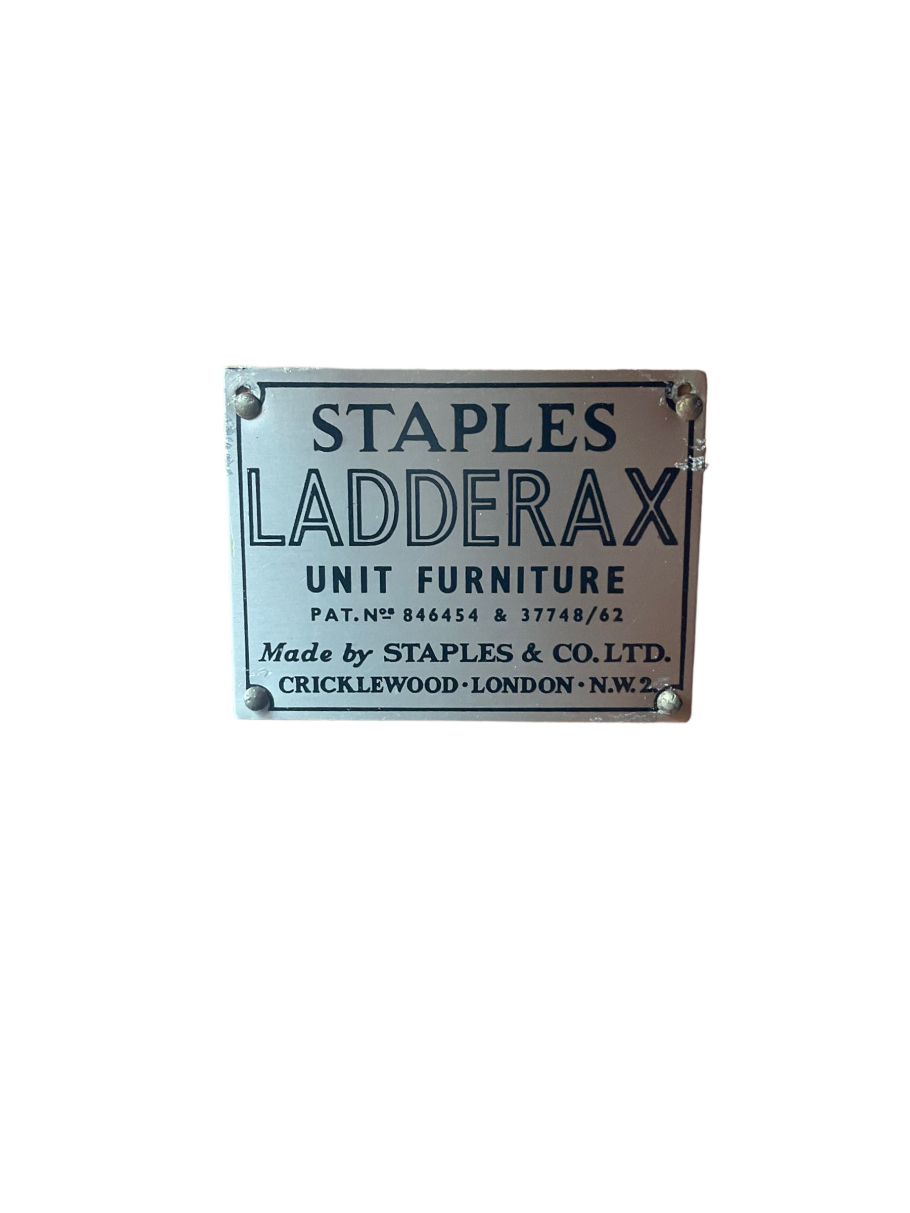 Staples Ladderax - mid-20th century teak and metal framed modular wall unit, fitted with central fall-front cupboard enclosing correspondence dividers, over secondary separate teak fall-front cupboard, adjustable shelf to top