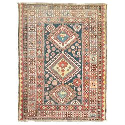 Vintage Caucasian Shirvan hand-knotted rug, indigo field with an arrangement of geometric ...