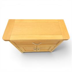 Modern oak living room set comprising; a small side cabinet, corner TV stand and coffee table, cabinet with single drawer and cabinet, finished with metal handles (H 80cm, D 32cm, W 80cm), TV stand with open recess and rear aperture for wires, above nine drawers with chrome pulls (H 62cm, D 50cm, W 84cm)  coffee table with curved edges and full length undertier (H 50cm, D 60cm, W 90cm)  