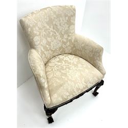 20th century mahogany framed armchair upholstered in beige damask, carved cabriole legs on ball and claw feet 