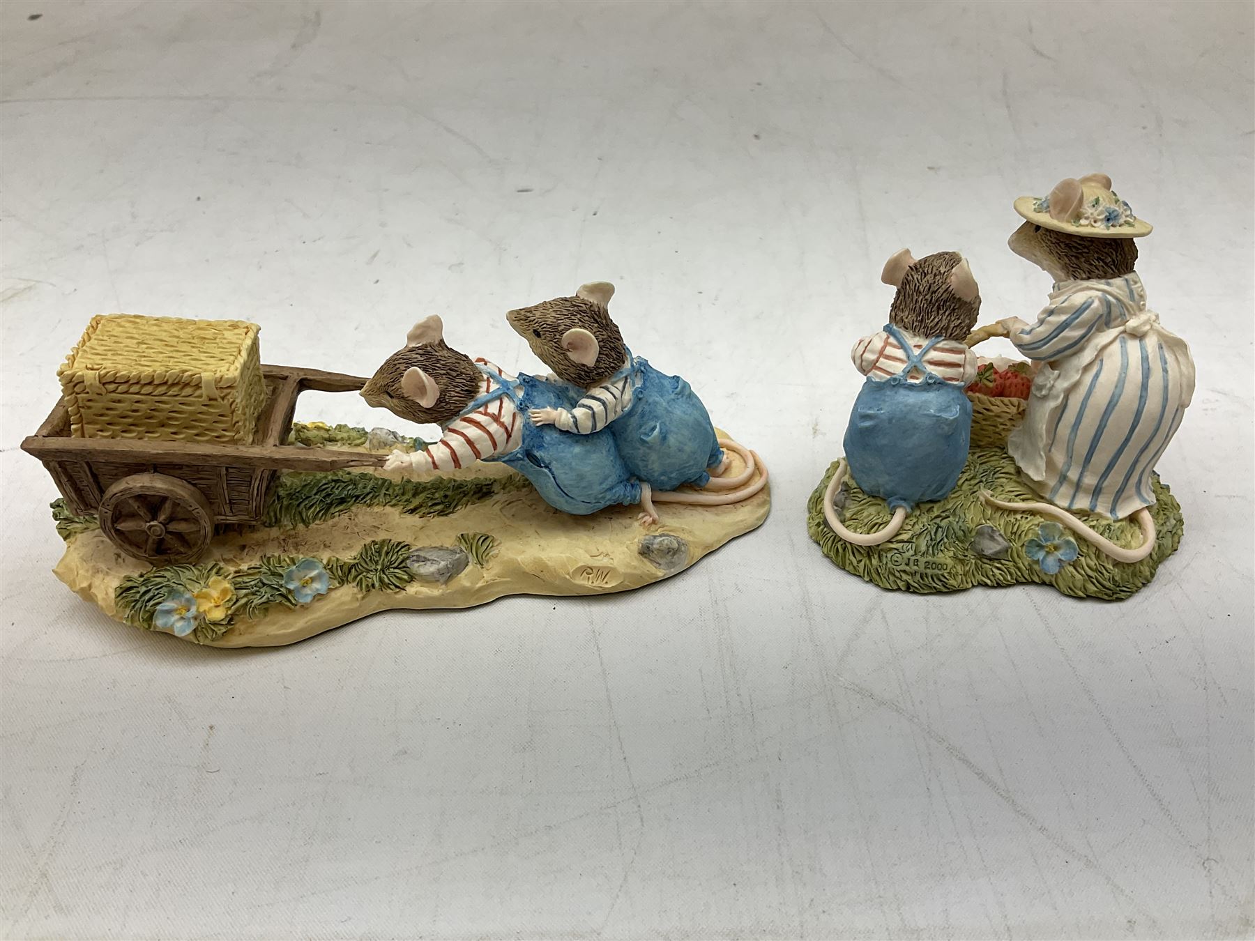 Four Classic Collectables Brambly Hedge figures, comprising Basil Pouring Drinks, Wilfred and Teasel Pushing Cart, Poppy Carry Pails and Mrs Apple, Wilfred and Basket, all boxed