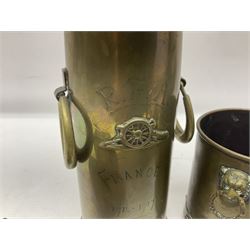 Trench Art - WWI 0-8-0 steam locomotive made from brass, copper and late Victorian pennies and half-pennies L17.5cm; WWI brass and copper tank candleholder; WWI brass shell case two-handled vase inscribed 'RFA France 1914-17'; and an unrelated brass plant holder (4)
