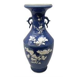 Chinese blue and white floor vase, applied decoration in white with blossoming branches on light blue ground, with moulded twin handles and flared rim, H57cm