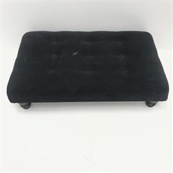  Rectangular footstool, upholstered in buttoned black fabric, turned supports, W97cm, H26cm, D57cm  
