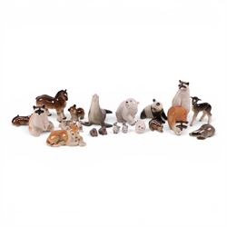 Collection of USSR Lomonosov figures, including racoons, sea lion, horse, lion cubs etc 
