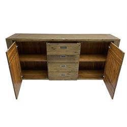 Contemporary hardwood sideboard, fitted with four drawers flanked by two cupboards, each with recessed metal handles