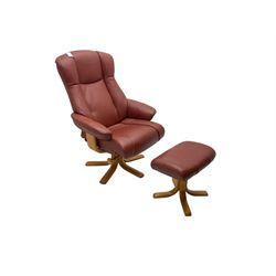 Mid-20th century design reclining armchair with swivel action, upholstered in red leather, raised on U-shaped supports with quadruform base, with matching footstool