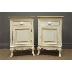  Pair French style painted bedside chests, single drawer above cupboard door, shaped apron, fleur de lis carved cabriole legs, W45cm, H70cm, D35cm  