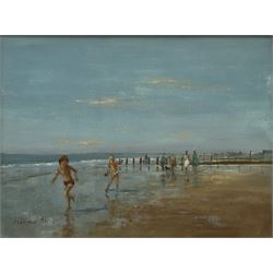 William Burns (British 1923-2010): 'Beach Games' South Beach Filey, oil on board signed, titled verso 29cm x 40cm 
Provenance: direct from the artist's family. Born in Sheffield in 1923, William Burns RIBA FSAI FRSA studied at the Sheffield College of Art, before the outbreak of the Second World War during which he helped illustrate the official War Diaries for the North Africa Campaign, and was elected a member of the Armed Forces Art Society. On his return to England, he studied architecture at Sheffield University and later ran his own successful practice, being a member of the Royal Institute of British Architects. However, painting had always been his self-confessed 'first love', and in the 1970s he gave up architecture to become a full-time artist, having his first one-man exhibition in 1979.