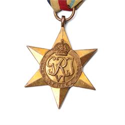 Group of five WWII medals comprising War Medal, 1939-1945 Star, Africa Star with 8th Army clasp, Italy Star and France and Germany Star, another group of War and Defence Medals, 1939-1945 Star and Africa Star, and a copy of the New Testament from George VI inscribed Leonard John Green, 3525653, RAOC, REME 1942, Att Black Watch 1944 and 1945 and Lee Enfield rifle number K91476